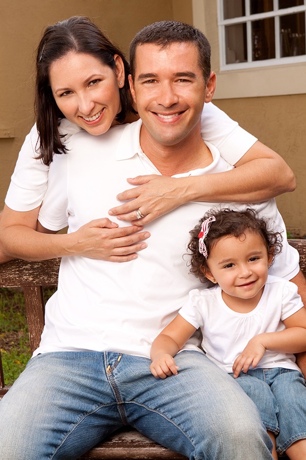 Hispanic family smiling